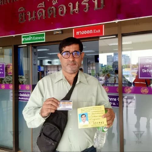 Happy client with Thai driving license