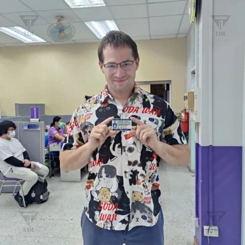 Client at the DLT office with Thai driving license