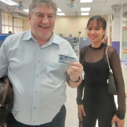 Older European client with our Thai staff member at DLT