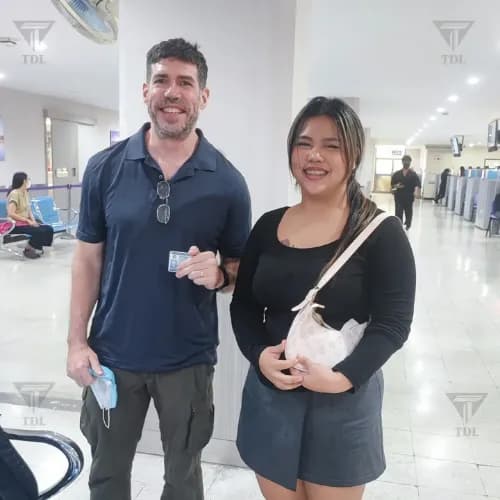 Client couple at DLT office with license
