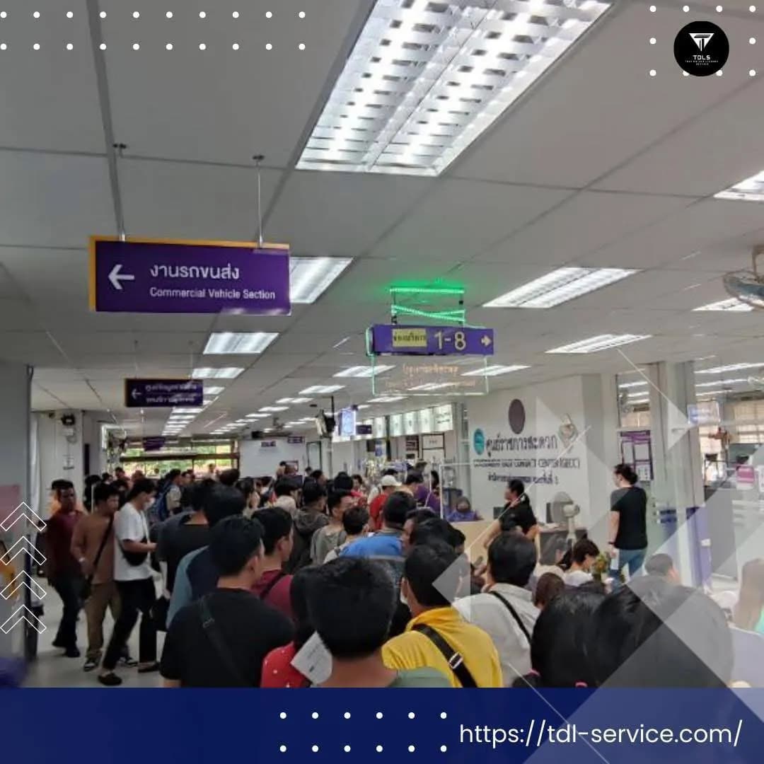 Crowded hallway at a DLT office with people waiting in line